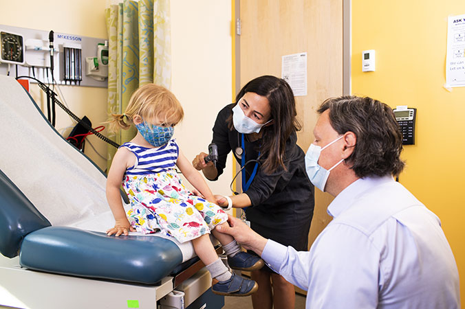 HCHC doctors with young patient